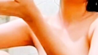 Sexy indian beauty stripping nude taking bath